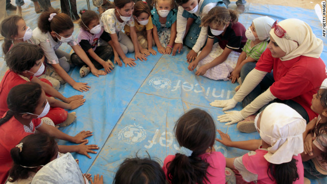 Syrian refugee children playing on Saturday in a tent at the Zaatari refugee camp in Jordan.