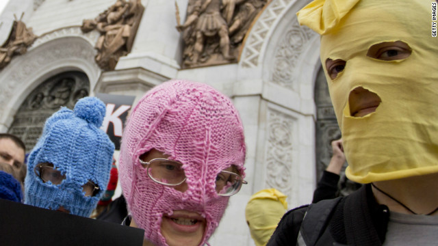 Campaigners wear the band's trademark colorful balaclavas in a demonstration outside the Church of Christ the Savior in Moscow.
