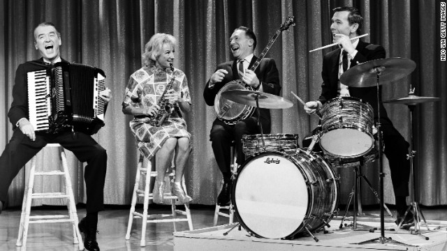 From left, actor James Stewart, Diller, Los Angeles Mayor Sam Yorty and host Johnny Carson peform on "The Tonight Show" in 1964.