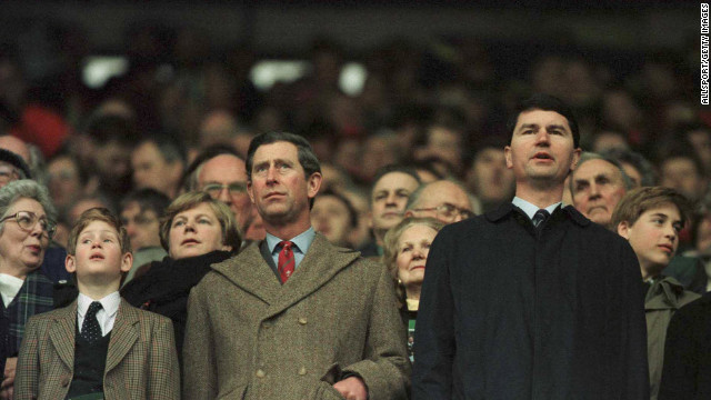 Charles, the Prince of Wales, and his son Prince Harry stand for the anthems during the Wales versus Scotland game in Cardiff, Wales, on February 17, 1996.