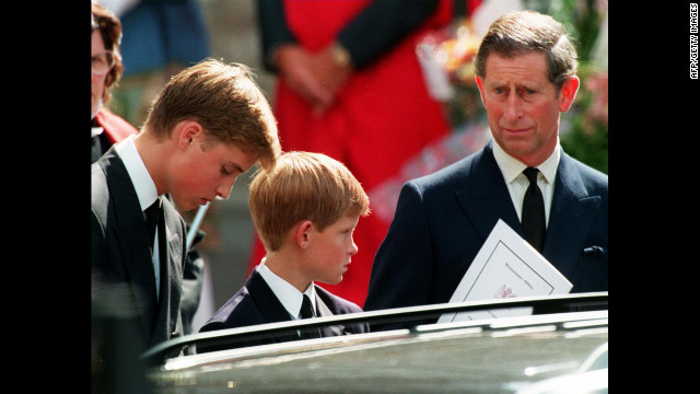 Left to right: Princes William, Harry and their father Prince Charles wait in front of the Westminster Abbey in London after the funeral ceremony of Diana Princess of Wales on September 6, 1997.