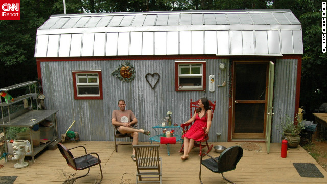 Downsizing from a 1,500-square-foot house to a tiny 168-square-foot dwelling in Floyd, Virginia, Hari Berzins says she loves the freedom when it comes to tiny living. "We live larger on our 3-acre hillside," she said. "We have more time to enjoy each other, tend to our large garden and cultivate a supportive community."<br/><br/><br/><br/><a href='http://ireport.cnn.com/docs/DOC-817695' target='_blank'>See more photos of their charming home on Hari Berzin's iReport</a>.