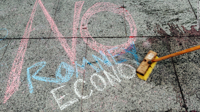 A chalk message is left by protesters a few blocks from the Tampa Bay Times Forum.