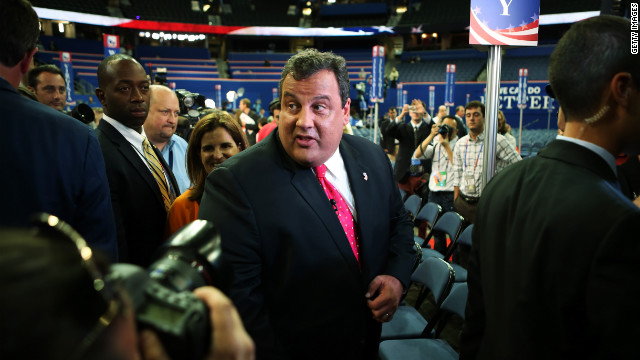 New Jersey Gov. Chris Christie walks through the convention center before the start of the abbreviated first day.