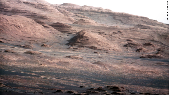 An image released Monday, August 27, was taken with Curiosity rover's 100-millimeter mast camera, NASA says. The image shows Mount Sharp on the Martian surface. NASA says the rover will go to this area. Curiosity arrived on Mars early on August 6 and began beaming back images from the surface. See all the images here as they are released. Check out images from previous Mars missions.