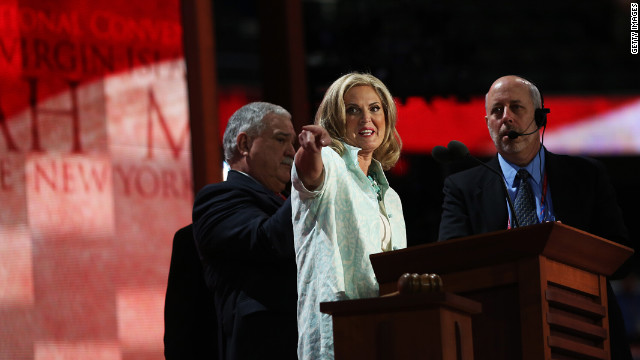 Ann Romney, Republican presidential candidate former Massachusetts Gov. Mitt Romney's wife, stands onstage with stage manager Howard Kolins during a soundcheck.
