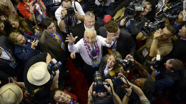 Republican candidate Ron Paul waves to supporters at the Tampa Bay Times Forum.