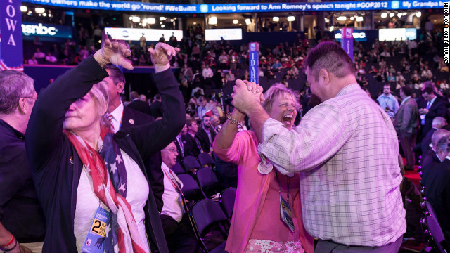 Washington state delegates Trin Wilbur and Jeff McMorris dance on the convention floor.