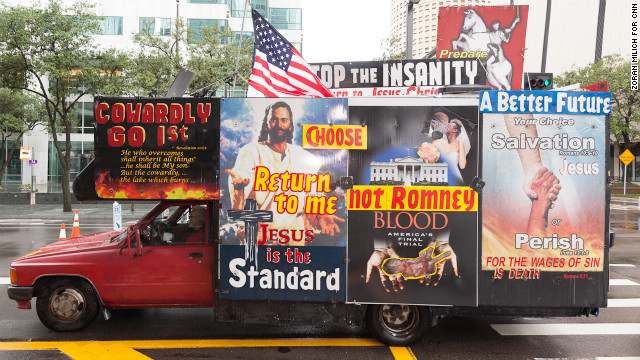 One of many message-covered vehicles drives through the streets of Tampa.