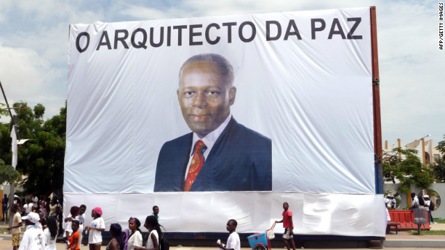 Earlier this year, Angola celebrated 10 years of the end of its civil war. Here, Luanda residents walk in front of a giant portrait of President dos Santos, with text reading "The Architect of Peace" on April 4, 2012.