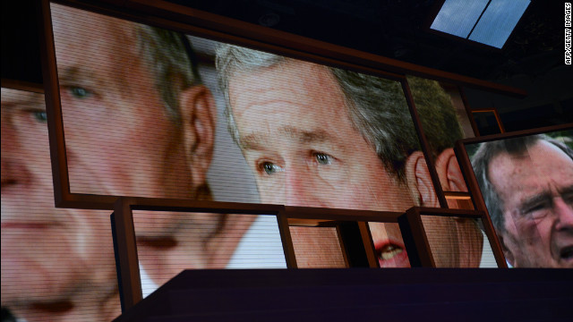 Former President George W. Bush is shown on the giant screens at the Tampa Bay Times Forum.