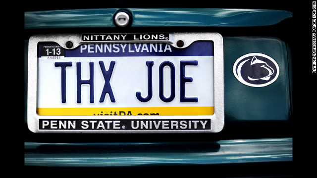 A car parked in a garage on campus has a license plate message directed at the former Penn State football coach. 