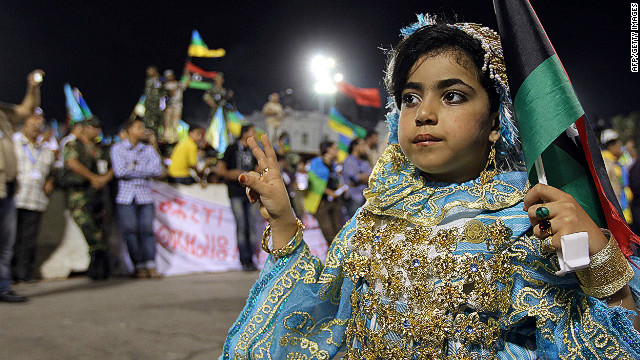 A Berber girl dressed in traditional attire at a Berber cultural festival in Tripoli. Public displays of Amazigh culture were forbidden under the Gadhafi regime.