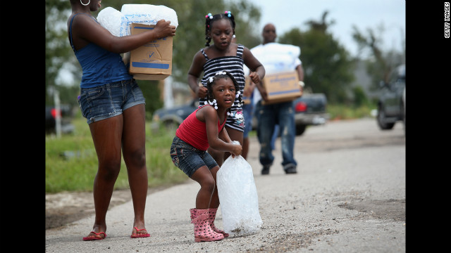 Thousands being rescued as waters rise from Isaac - CNN.