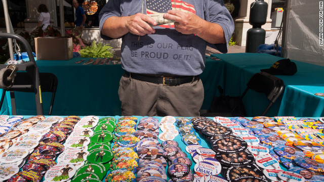 A man sells buttons supporting President Barack Obama on Monday.