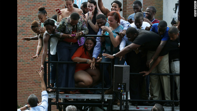 Obama greets supporters during a campaign rally Tuesday at Norfolk State University in Virginia. 