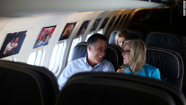 Mitt Romney and his wife, Ann Romney, talk on the campaign plane on Saturday, September 1, en route to their vacation home in New Hampshire.