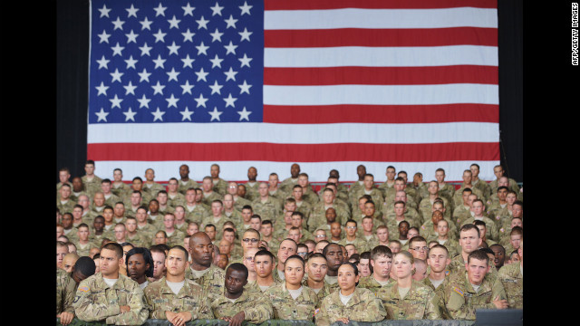 Troops await the arrival of the president for an address inside the 1st Aviation Support Battalion Hangar on Friday, August 31, at Fort Bliss, Texas. 