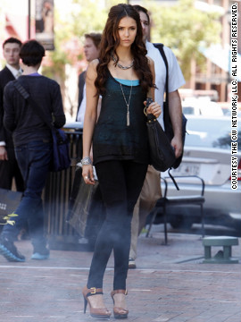 Dobrev plays centuries-old vampire Katherine, pictured, as well as her human doppelganger Elena. Leverett makes it easy for viewers to differentiate between the characters by dressing Katherine in edgier styles. "I like to think that Katherine saw those tan Michael Kors heels on some unsuspecting Chicago socialite and probably just compelled her to hand them over," the costume designer said.