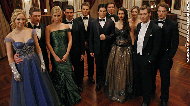 The characters on "The Vampire Diaries" got all dolled up to attend a ball at vampire Klaus' (Joseph Morgan) house last season. <br/><br/>"We wanted it to have a Cinderella feel to it," costume designer Leigh Leverett said. Candice Accola's character Caroline, far left, donned an Alberto Makali dress, while Nina Dobrev's Elena, fourth from the right, wore a vintage black and gold ball gown. As for vampire Rebekah, played by Claire Holt, third from the left, "This was the first dress she tried on. ... Rebekah has been around for 1,000 years ... her look is a little more sophisticated than our Mystic Falls girls."