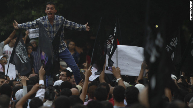 People shout slogans in front of the U.S. Embassy in Cairo.