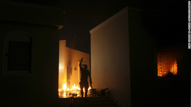 A protester reacts as the U.S. Consulate in Benghazi burns Tuesday night. 