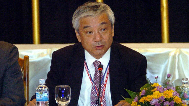 Shinichi Nishimiya (C) pictured in 2005 at a meeting of the Association of Southeast Asian Nations (ASEAN).