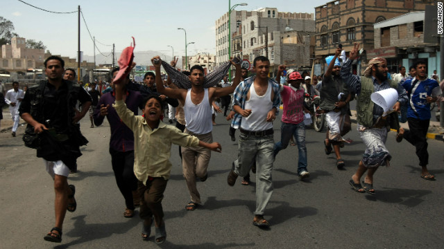 Protesters chant slogans during a march to the U.S. Embassy in Sanaa, Yemen, on Thursday, September 13. One protester was killed in clashes when Yemeni security forces dispersed hundreds of demonstrators who gathered around and inside the U.S. Embassy in Sanaa as part of widespread anger in at least 11 countries over a film ridiculing Islam's Prophet Mohammed. 