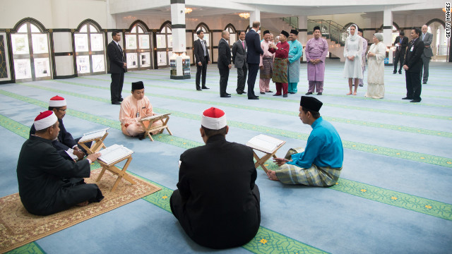 The royal couple visits Assyakirin Mosque in Kuala Lumpur, Malaysia, on Friday.