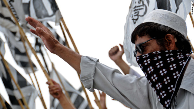 Supporters of Jamat ud Dawa shout during a protest against an anti-Islam video in Peshawar, Pakistan, on Friday.