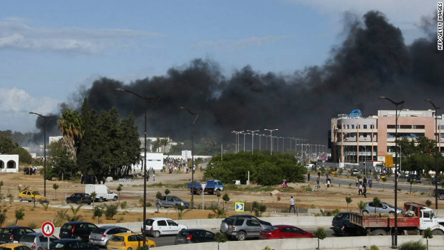 Smoke rises from the U.S. Embassy in Tunisia's capital during Friday protests against a film mocking Islam.