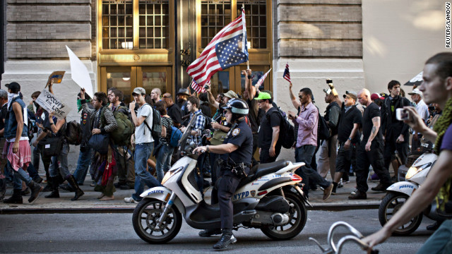 Members of Occupy Wall Street march from Washington Square Park to New York's financial district on Saturday.