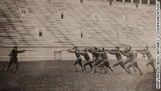 Harvard ROTC cadets are doing a bayonet drill in the school's stadium in 1917-1918.