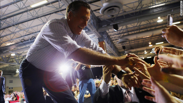 Romney shakes hands with supporters during the Juntos Con Romney Rally in Miami on Wednesday.