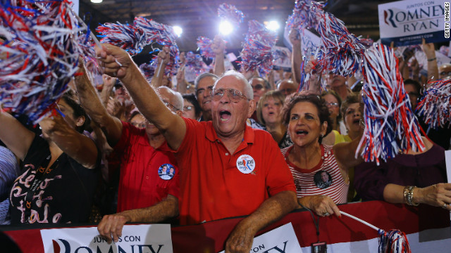 Supporters cheer as they listen to Romney speak during a Juntos Con Romney Rally at the Darwin Fuchs Pavilion on Wednesday, September 19, in Miami.