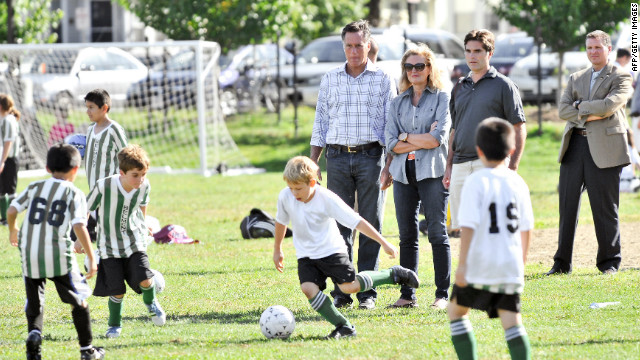 From left to right: Romney, his wife Ann, and son Tagg watch one of Tagg's sons play soccer in Belmont, Massachusetts, on Saturday, September 15.