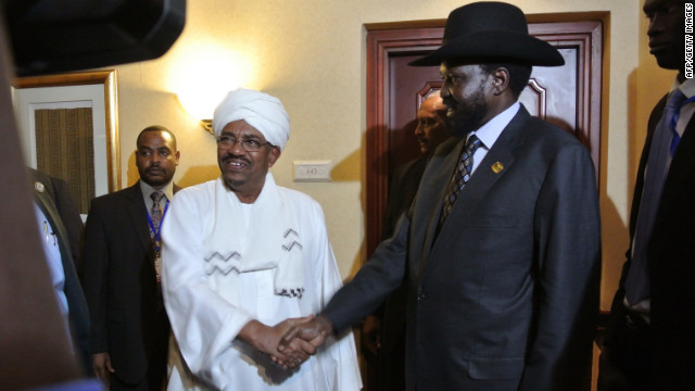 Sudanese President Omar Al Bashir, left, shakes hands with South Sudanese President Salva Kiir following a meeting in July.