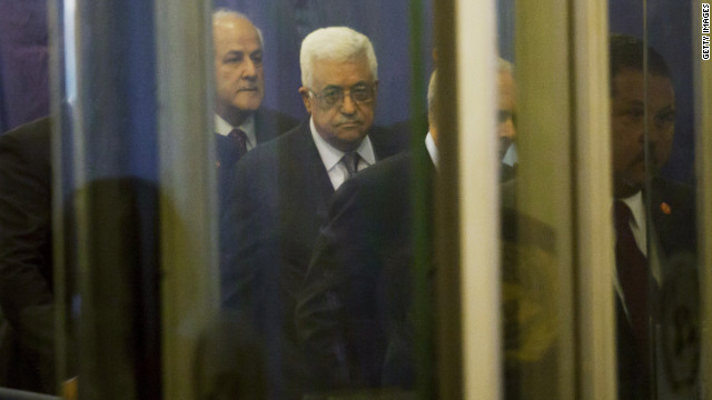 Palestinian Authority President Mahmoud Abbas, center, arrives at the United Nations on Tuesday.