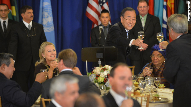 United Nations Secretary-General Ban Ki-moon, standing, makes a toast during a luncheon on Tuesday as U.S. Secretary of State Hillary Clinton, left, looks on. 