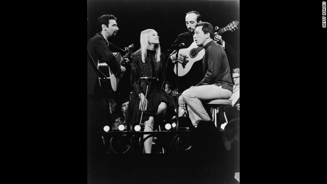 Williams, far right, sings with the folk music trio Peter, Paul and Mary during a TV appearance in 1966.