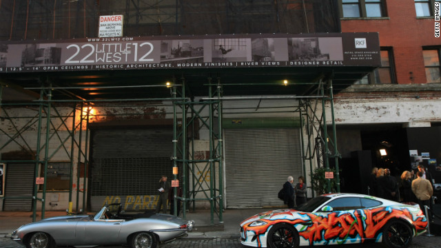 A specially designed Jaguar XKR and a 1961 Series 1 E-Type on display at the New York Auto Show on April 4, 2012 New York City. 