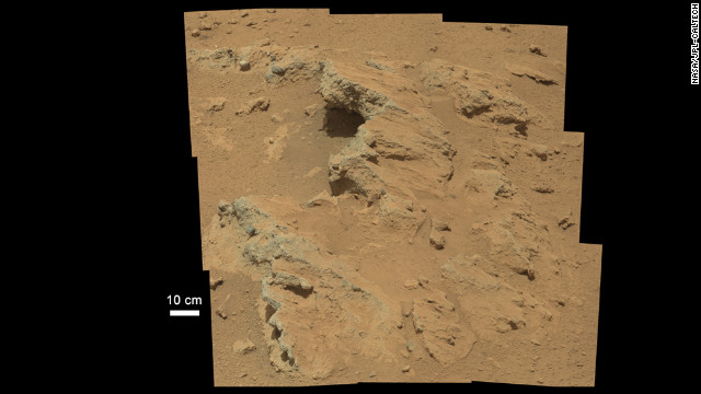 NASA's Curiosity rover found evidence for what scientists believe was an ancient, flowing stream on Mars at a few sites, including the rock outcrop pictured here. The key evidence for the ancient stream comes from the size and rounded shape of the gravel in and around the bedrock, according to the Jet Propulsion Laboratory/Caltech science team. The rounded shape leads the science team to conclude they were transported by a vigorous flow of water. The grains are too large to have been moved by wind.