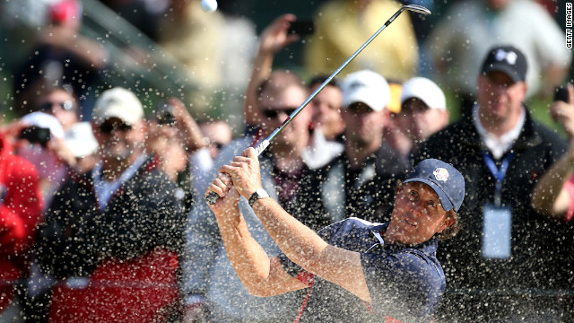 Phil Mickelson of the United States plays a bunker shot during the fourth and final preview day of the 39th Ryder Cup at Medinah Country Club on Thursday, September 27.