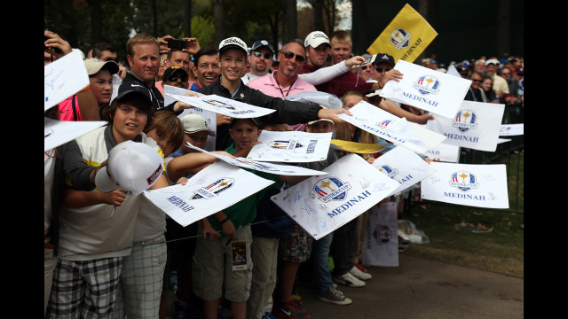 Fans wait for autographs during Thursday's practice round.