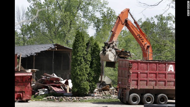 Demolition workers in 2006 tear down a horse barn for the FBI in a search for Hoffa's remains in Milford, Michigan. <a href='http://www.cnn.com/2006/US/05/17/hoffa.search/index.html'>The FBI had received a tip</a> that Hoffa was buried on the farm.