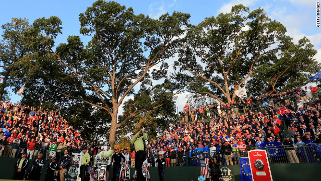 Lee Westwood of Europe watches his tee shot on the first hole Friday.