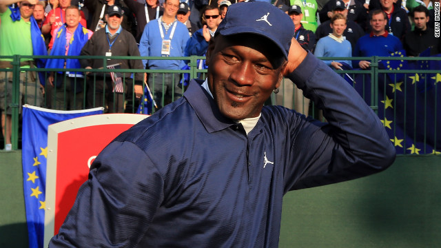 Basketball legend Michael Jordan waits on the first tee during the matches.