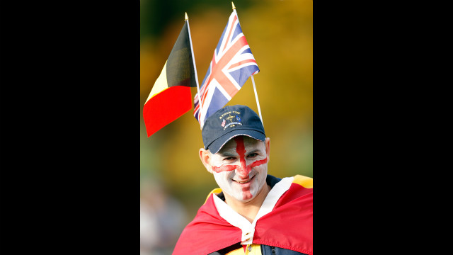 A fan of the European team watches the play.