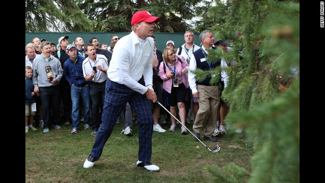 Steve Stricker of the United States hits a shot from the rough on the first hole.