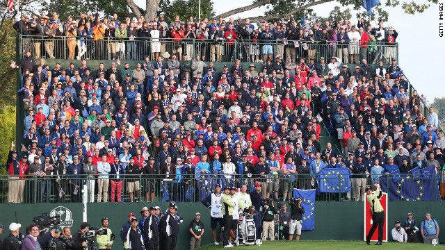 Luke Donald of Europe hits his tee shot on the first hole.